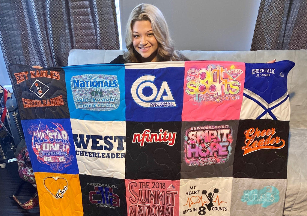 cheerleader holding t-shirt quilt