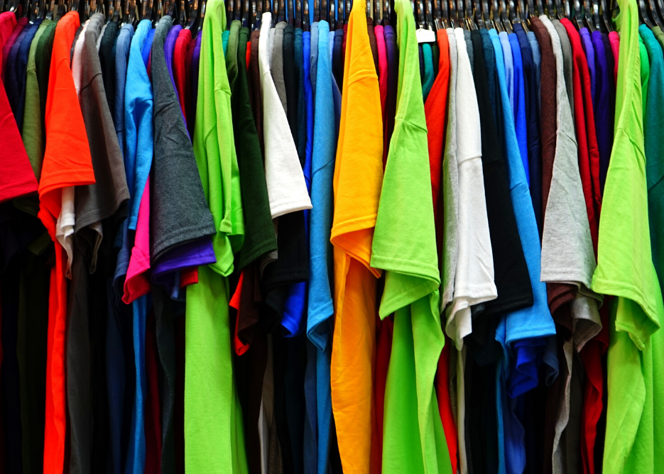 T-shirts to recycle hanging in closet